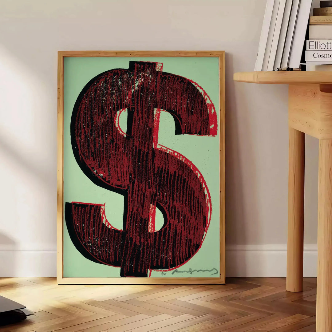 Pôster dinâmico preto e verde com sinais de dólar estilizados em um design moderno - ao lado de uma mesa de apoio redonda em madeira com livros