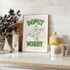 Playful donut illustration with groovy text in pastel colors - styled on a counter with eucalyptus and a bowl of lemons
