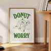 Playful donut illustration with groovy text in pastel colors - beside a round wooden side table with books