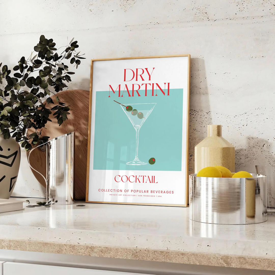 Illustration of a dry martini cocktail with green and red accents - styled on a counter with eucalyptus and a bowl of lemons