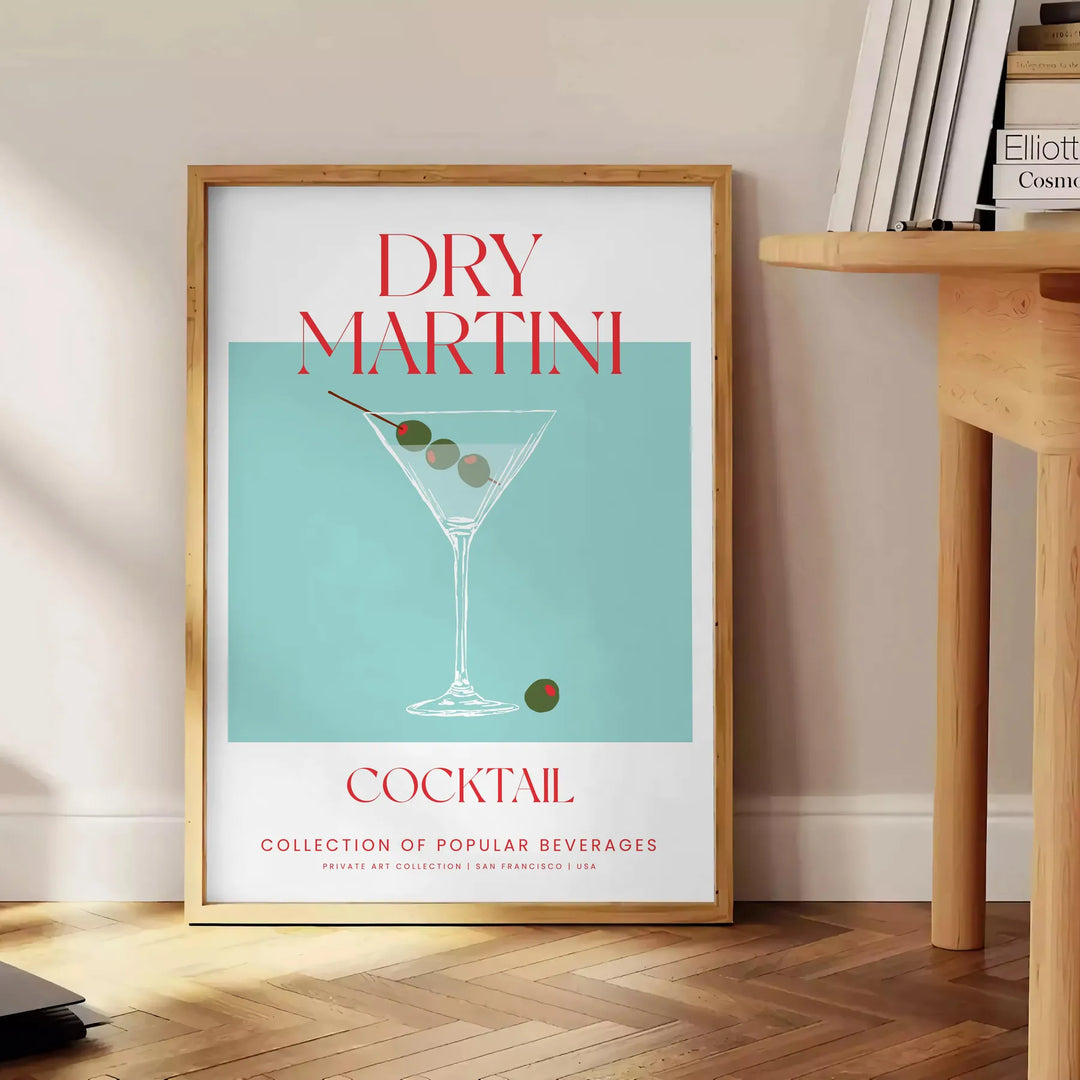 Illustration of a dry martini cocktail with green and red accents - beside a round wooden side table with books