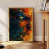 Abstract expressionism artwork with bold black and orange colors - beside a round wooden side table with books