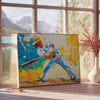 Abstract expressionism with swirling orange and blue colors - beside a round wooden side table with books