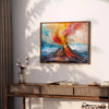 Abstract expressionist artwork with bold orange and brown colors - styled on a counter with eucalyptus and a bowl of lemons