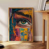 Abstract expressionism with dynamic green and orange splashes - beside a round wooden side table with books