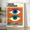 Abstract polka dot eyes in yellow and blue by Yayoi Kusama - in a bright minimalist room with a plant and an armchair
