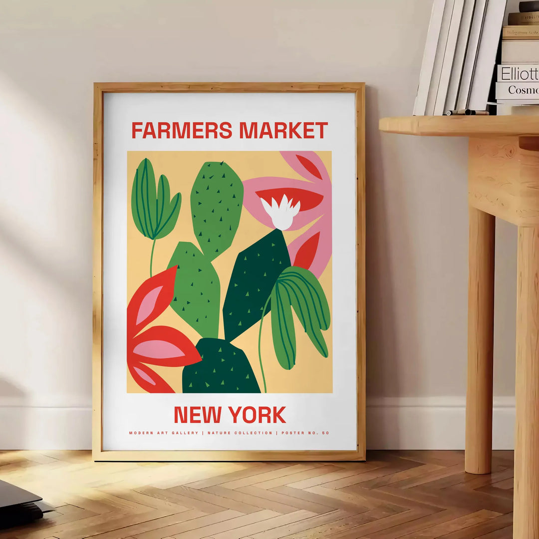 Botanical illustration featuring fresh greens and rich oranges from a farmer's market - beside a round wooden side table with books