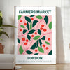 A colorful farmer's market scene with fresh produce and greenery - in a bright minimalist room with a plant and an armchair