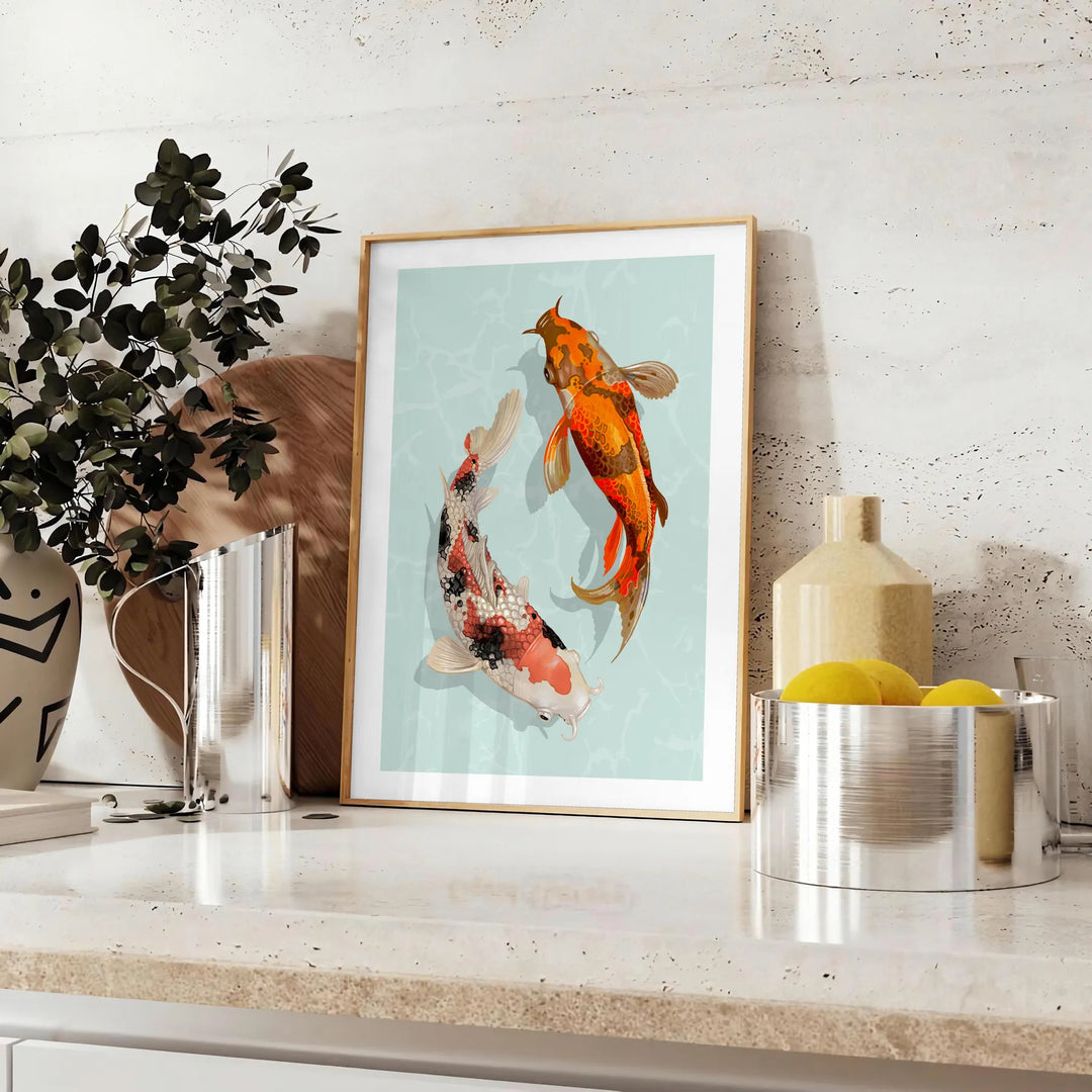 Detailed illustration of a black and green fish swimming in water - styled on a counter with eucalyptus and a bowl of lemons