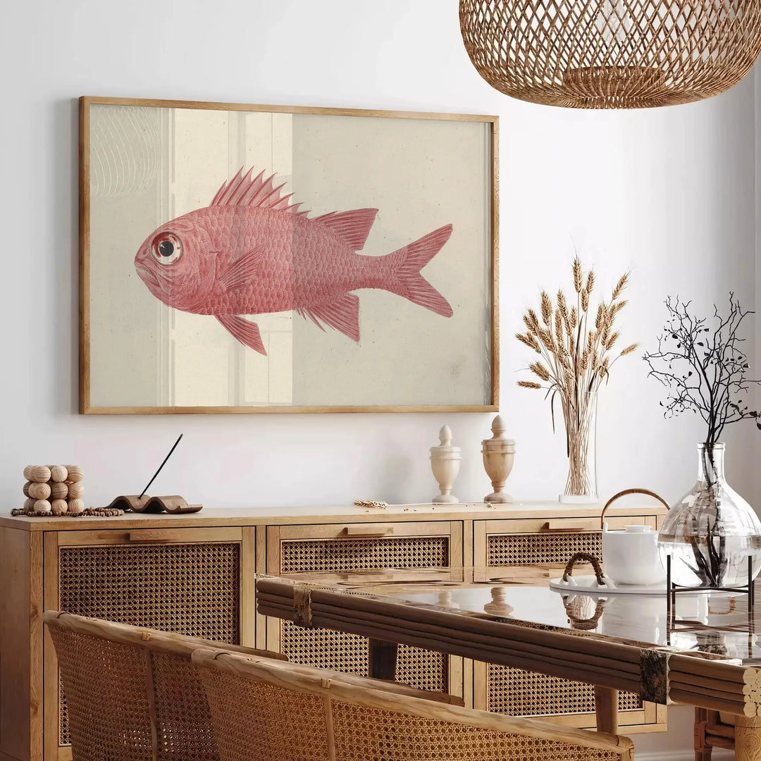 A colorful fish illustration with orange and gray tones on a textured background - in a Parisian living room with a sofa and a fig plant