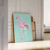 A pink flamingo standing gracefully against a black and orange background - leaning on a herringbone floor against a white panelled wall