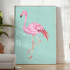 A pink flamingo standing gracefully against a black and orange background - in a bright minimalist room with a plant and an armchair