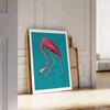 A pink flamingo standing gracefully against a soft blue background - leaning on a herringbone floor against a white panelled wall