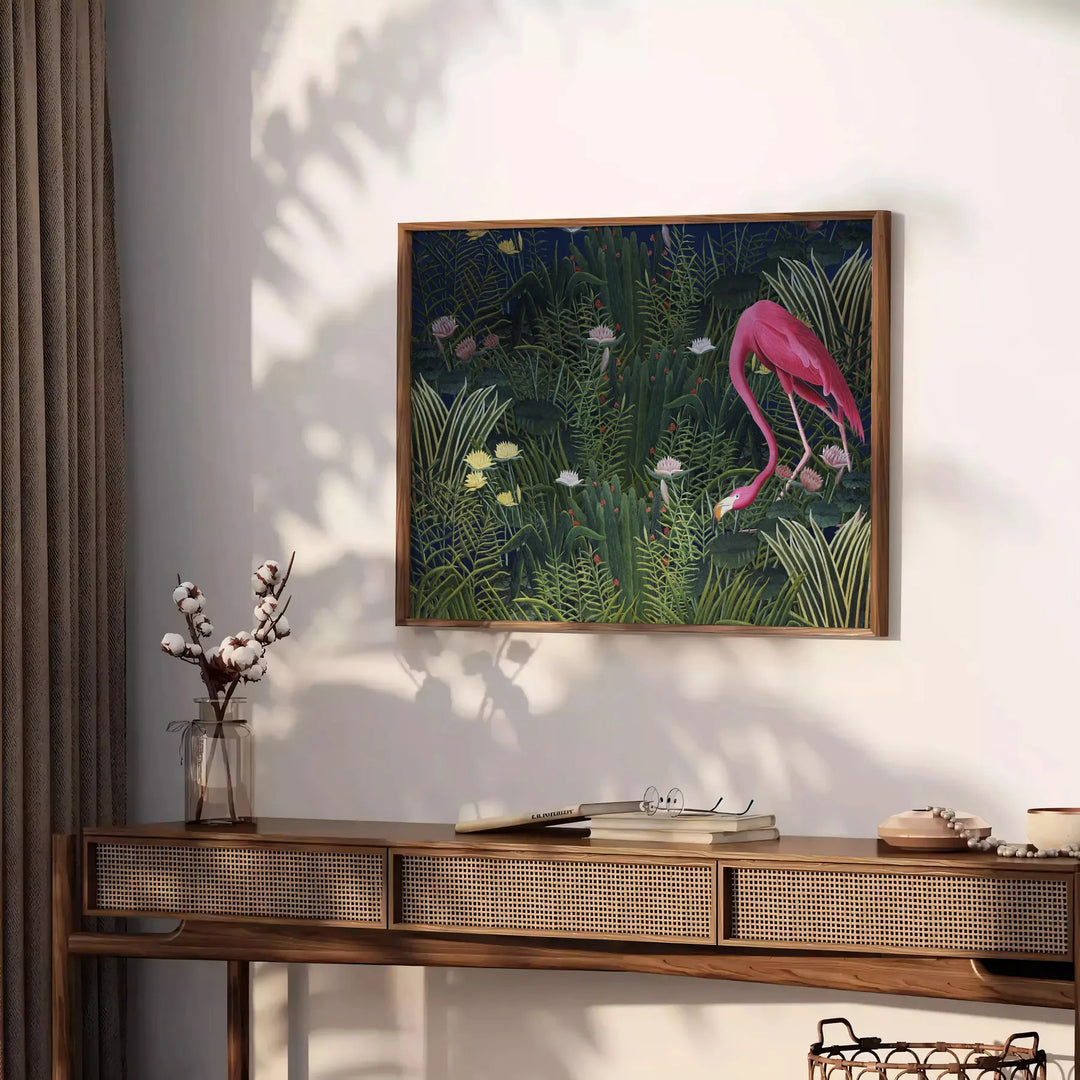 A flamingo illustration against a lush green background - styled on a counter with eucalyptus and a bowl of lemons