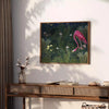 A flamingo illustration against a lush green background - styled on a counter with eucalyptus and a bowl of lemons