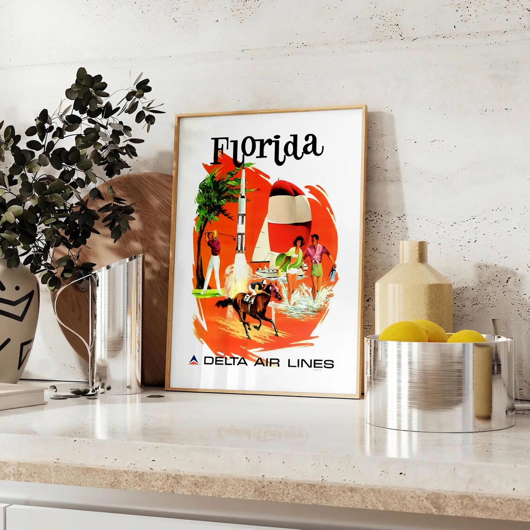 Vintage travel poster featuring Florida's iconic palm trees and sun, with warm earth tones - styled on a counter with eucalyptus and a bowl of lemons