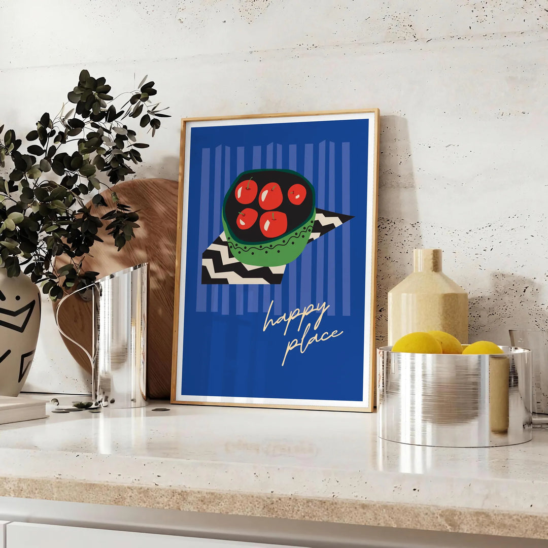 Abstract composition of fruits in green and black tones - styled on a counter with eucalyptus and a bowl of lemons