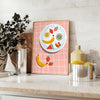 Colorful fruit arrangement on a gray background in a modern style - styled on a counter with eucalyptus and a bowl of lemons