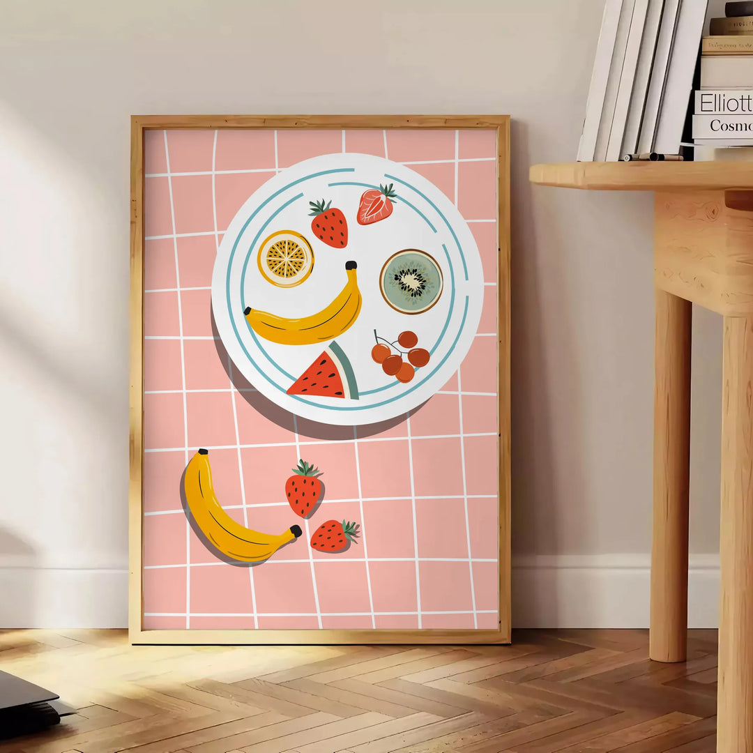Colorful fruit arrangement on a gray background in a modern style - beside a round wooden side table with books