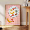 Colorful fruit arrangement on a gray background in a modern style - beside a round wooden side table with books