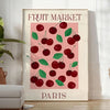 A graphic depiction of a fruit market in Paris with warm brown and orange tones - in a bright minimalist room with a plant and an armchair