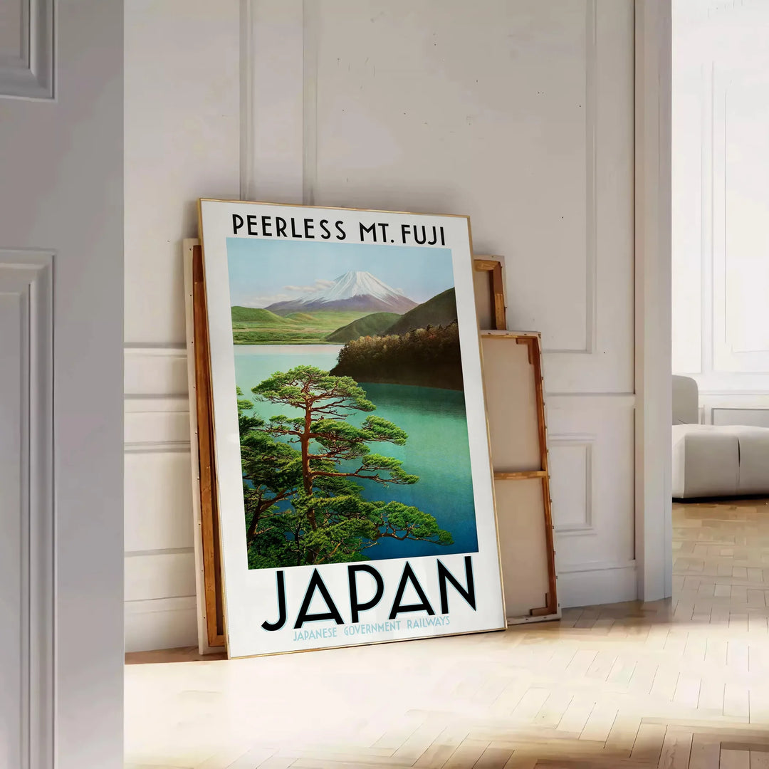 A serene depiction of Mount Fuji surrounded by green hills and gray skies - leaning on a herringbone floor against a white panelled wall