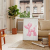 Colorful graphic design with warm brown and orange tones - in a Parisian living room with a sofa and a fig plant