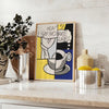 A playful illustration of coffee cups in black and green hues - styled on a counter with eucalyptus and a bowl of lemons