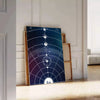 A cosmic scene featuring swirling green and blue hues in a galaxy. - leaning on a herringbone floor against a white panelled wall