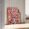 floral garden scene with black and orange tones - leaning on a herringbone floor against a white panelled wall