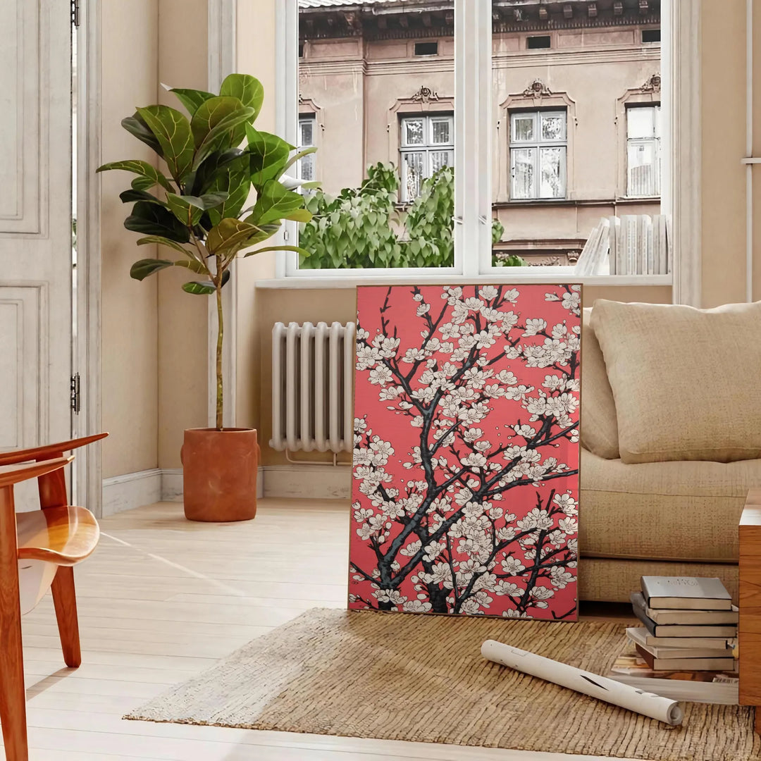 floral garden scene with black and orange tones - in a Parisian living room with a sofa and a fig plant