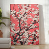 floral garden scene with black and orange tones - in a bright minimalist room with a plant and an armchair