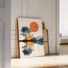 Geometric shapes in green and orange on a minimalist background - leaning on a herringbone floor against a white panelled wall