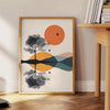 Geometric shapes in green and orange on a minimalist background - beside a round wooden side table with books