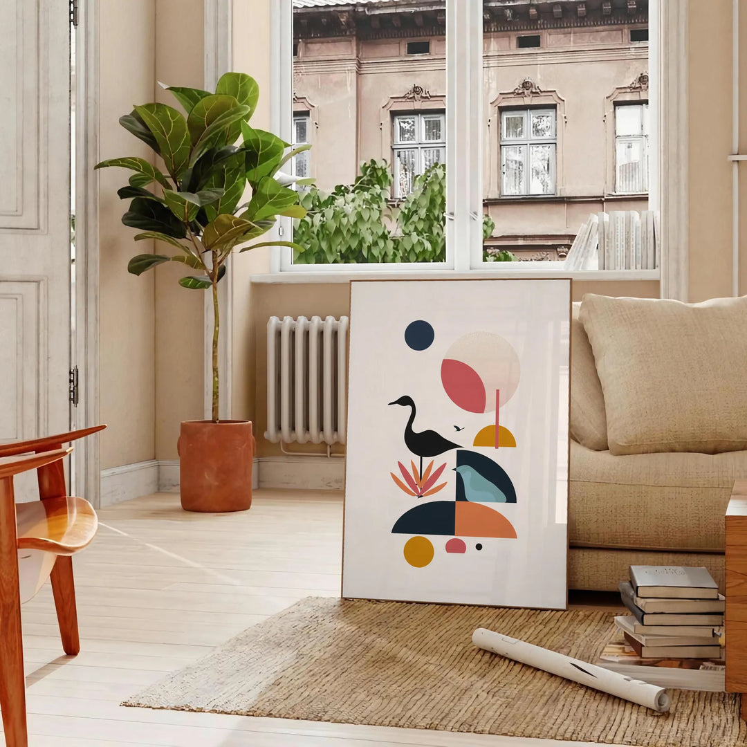 Geometric shapes in black and orange on a minimal background - in a Parisian living room with a sofa and a fig plant