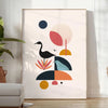 Geometric shapes in black and orange on a minimal background - in a bright minimalist room with a plant and an armchair