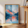 Geometric shapes in orange and blue on a minimal background - beside a round wooden side table with books