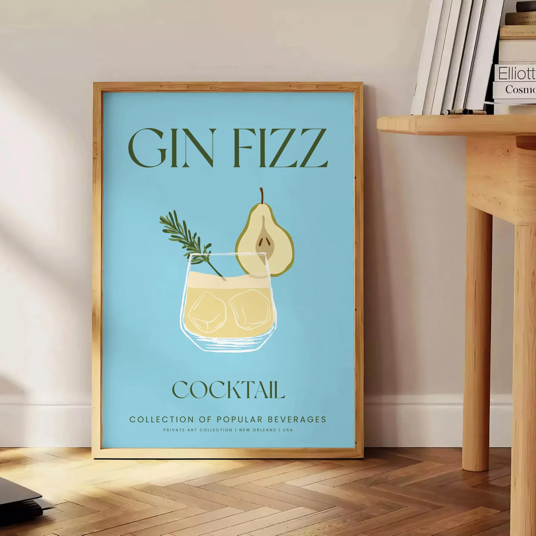 Illustrazione di un cocktail Gin Fizz in un bicchiere con tonalità verdi e grigie - accanto a un tavolino rotondo in legno con libri