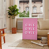 A group of diverse girls in playful poses, featuring warm brown and white tones - in a Parisian living room with a sofa and a fig plant
