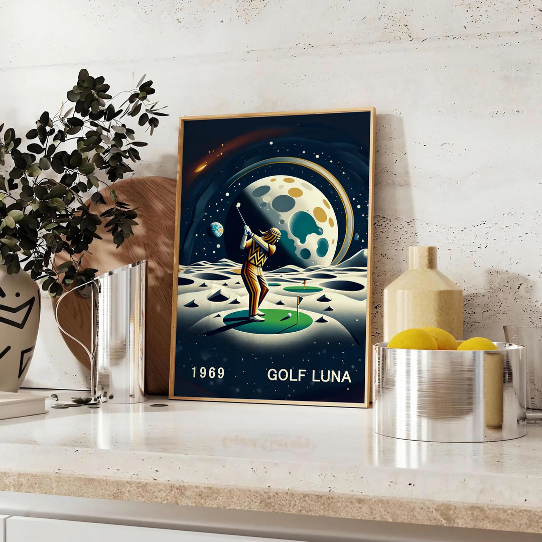 Art Deco poster featuring a golf silhouette under a large moon - styled on a counter with eucalyptus and a bowl of lemons