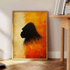 A bold illustration of a gorilla against a background of orange and red hues - beside a round wooden side table with books