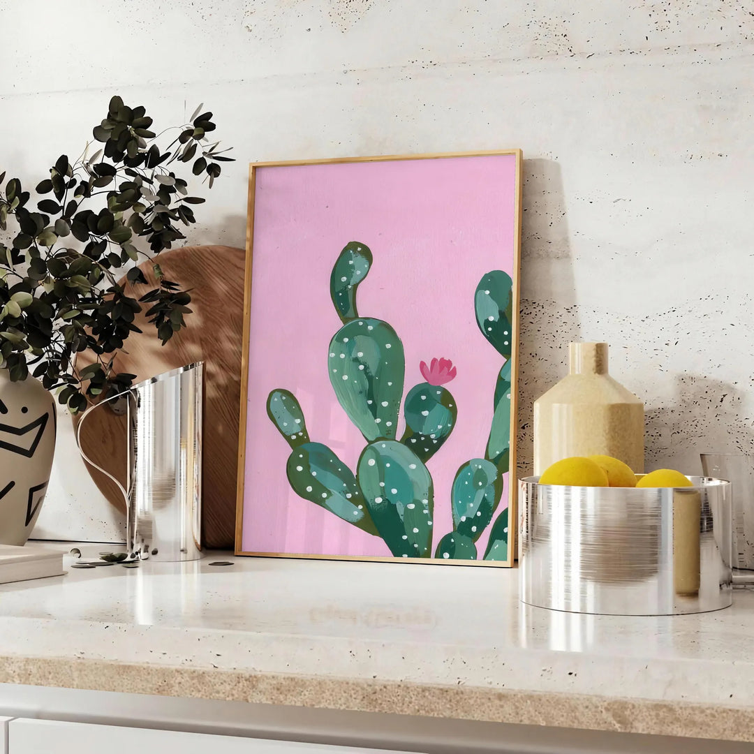 Abstract graphic art featuring dynamic shades of gray and orange - styled on a counter with eucalyptus and a bowl of lemons