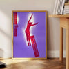Abstract design with bold purple and red colors in a modern style - beside a round wooden side table with books