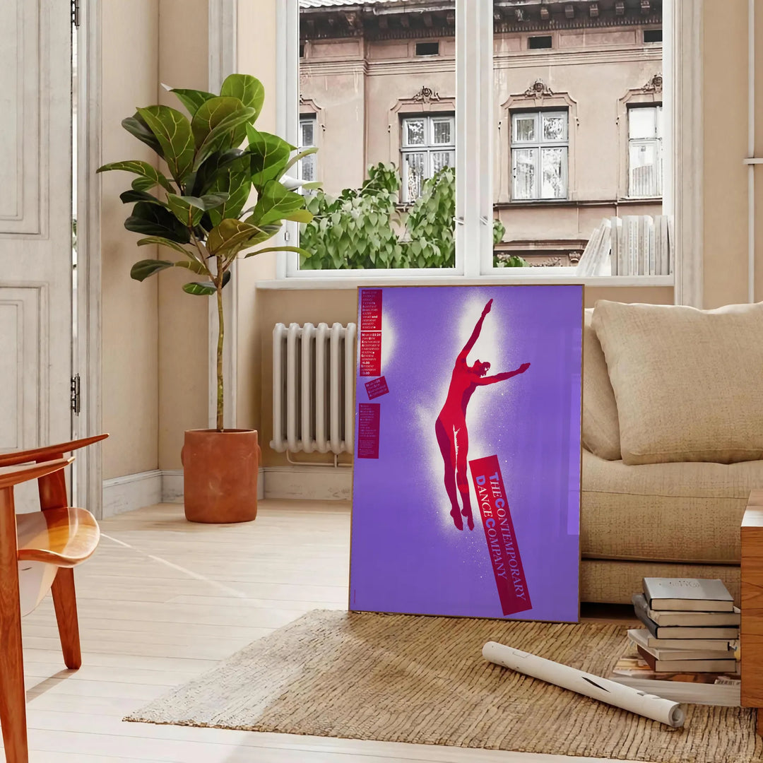 Abstract design with bold purple and red colors in a modern style - in a Parisian living room with a sofa and a fig plant