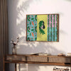 Abstract graphic design in shades of green and gray - styled on a counter with eucalyptus and a bowl of lemons