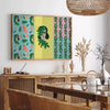 Abstract graphic design in shades of green and gray - in a Parisian living room with a sofa and a fig plant