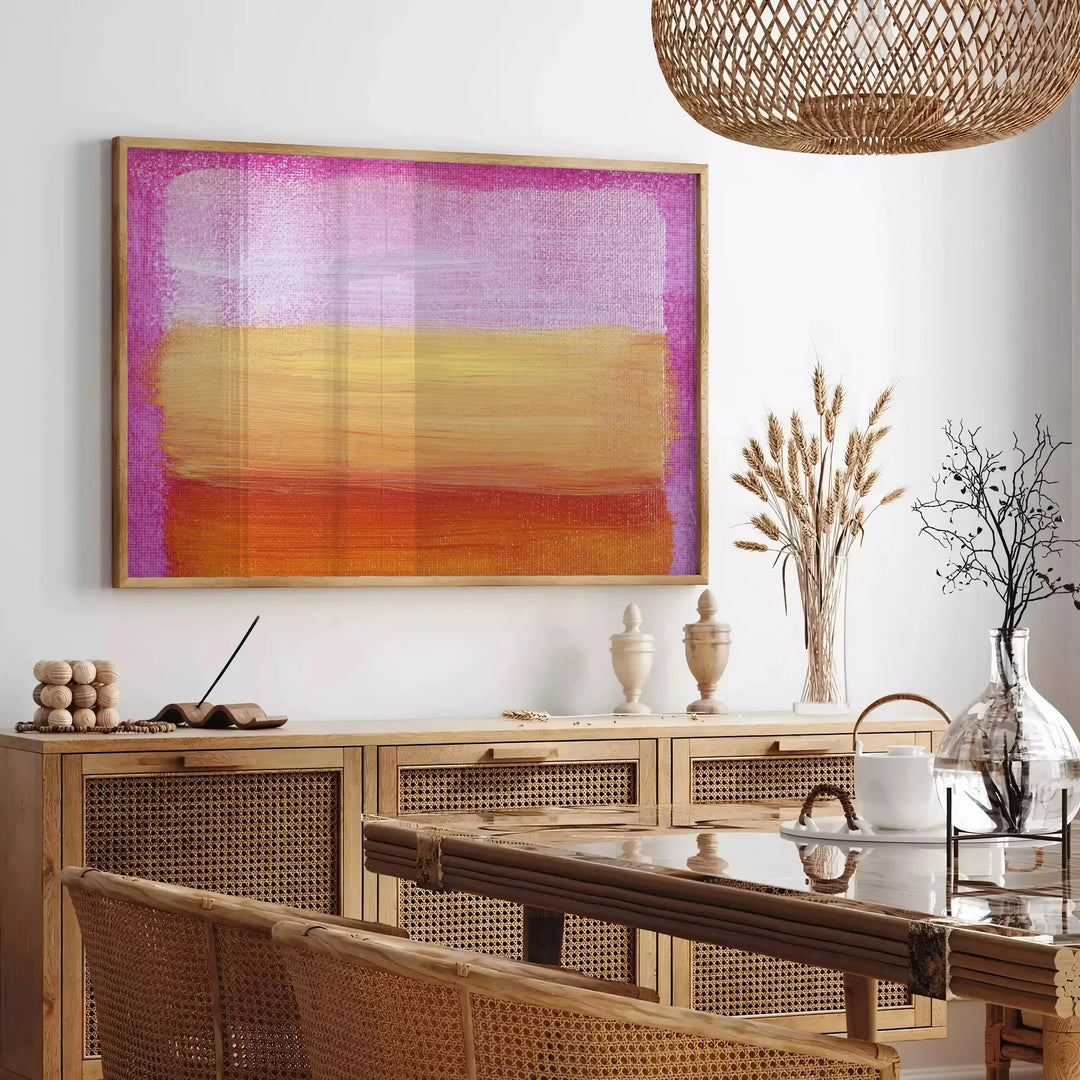 Abstract graphic print featuring green and blue space elements - in a Parisian living room with a sofa and a fig plant
