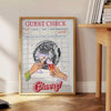 Graphic art print featuring a guest check design in green and orange hues - beside a round wooden side table with books