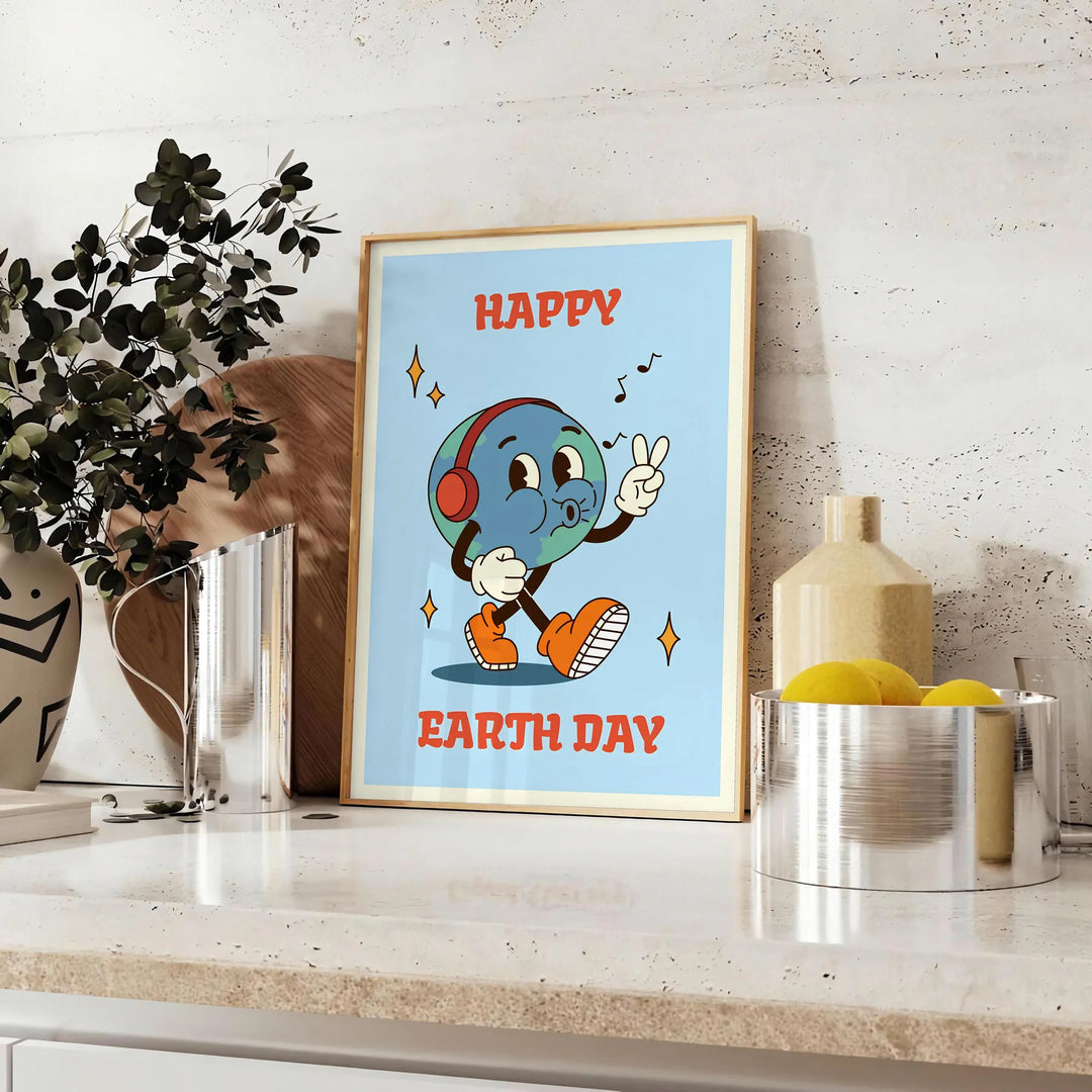 Affiche au style rétro présentant un design coloré pour la Journée de la Terre avec des teintes orange et noires - sur un plan de travail avec eucalyptus et coupe de citrons