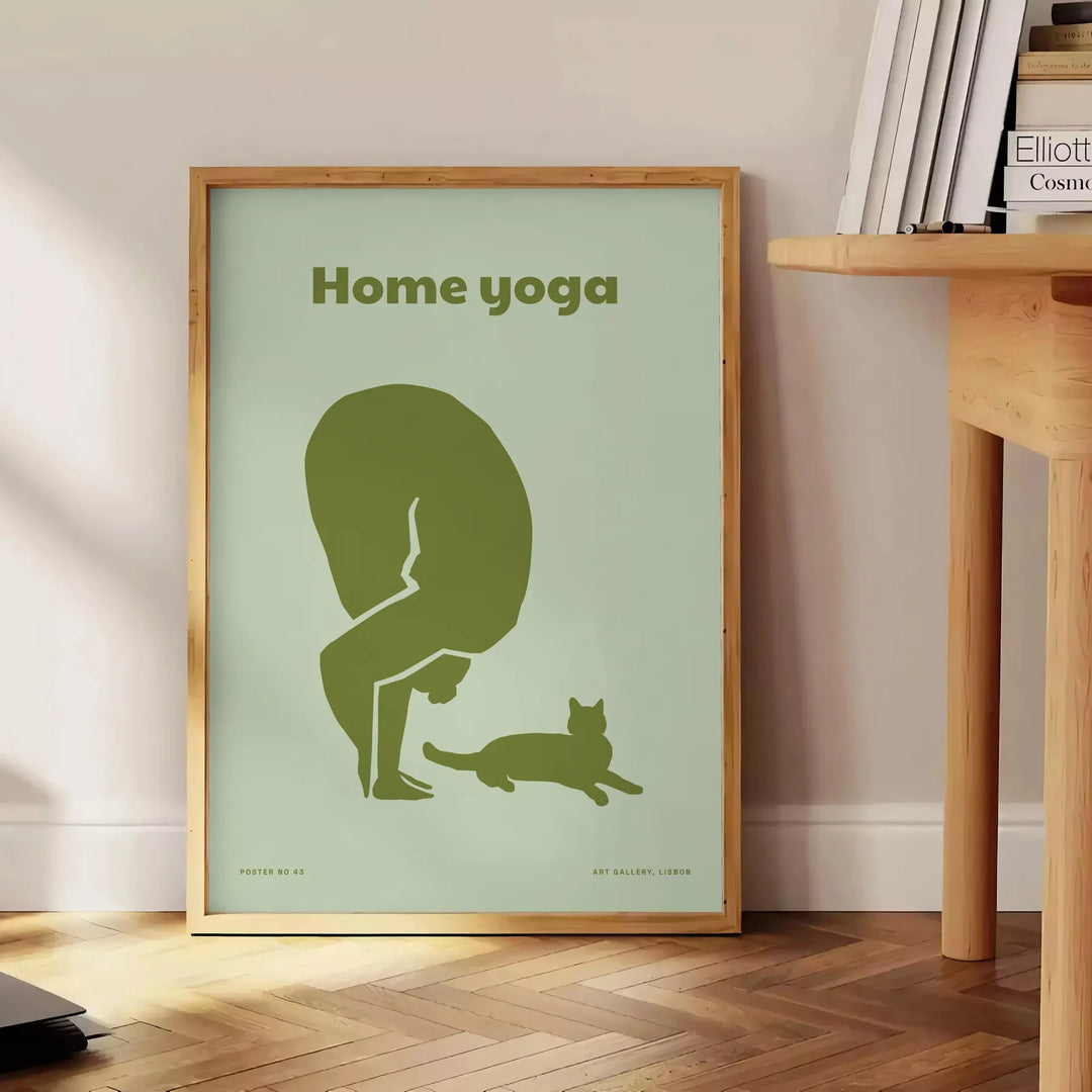 A serene yoga scene with a person practicing in calming green and gray tones - beside a round wooden side table with books